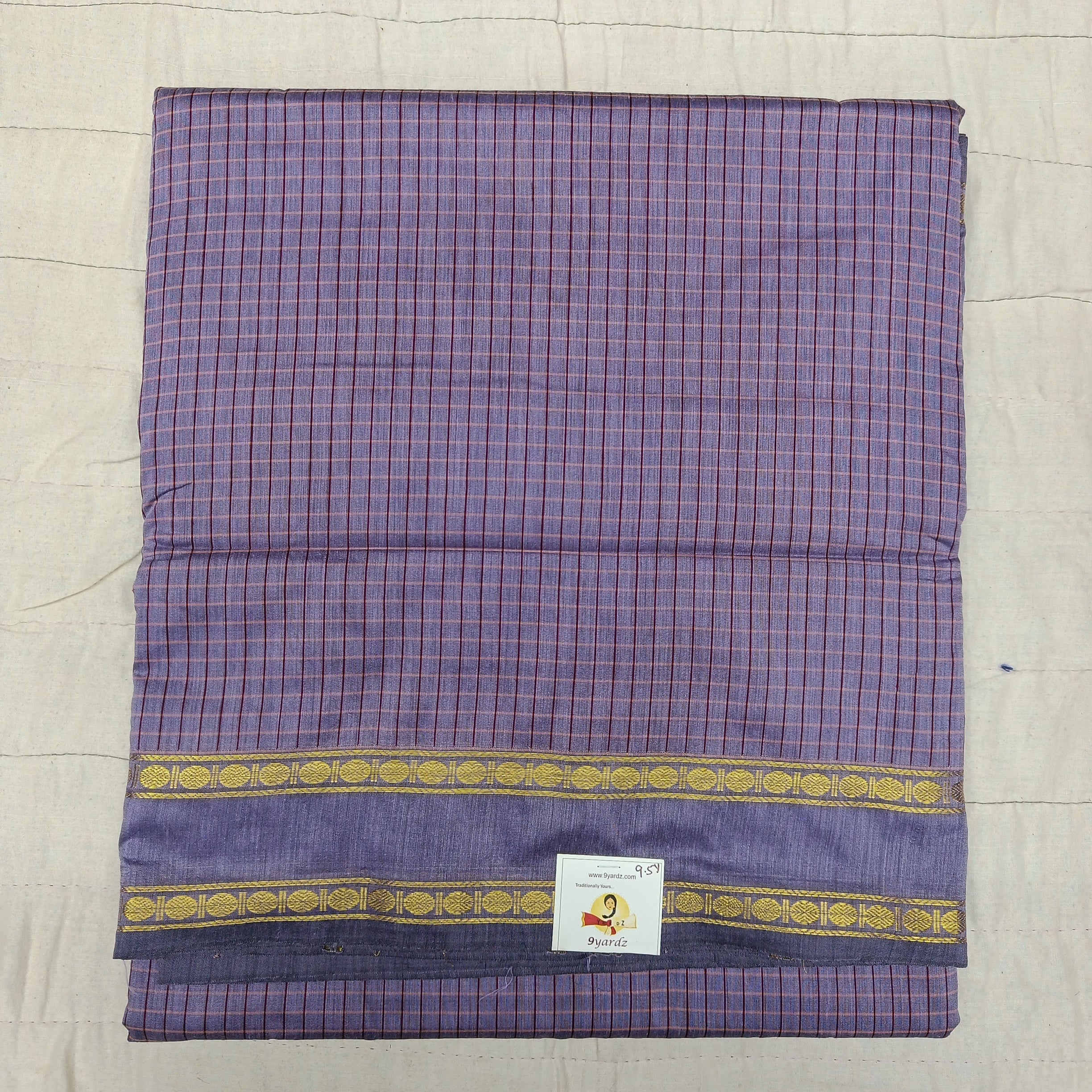 Kalyani Cotton checked 9.5 yards