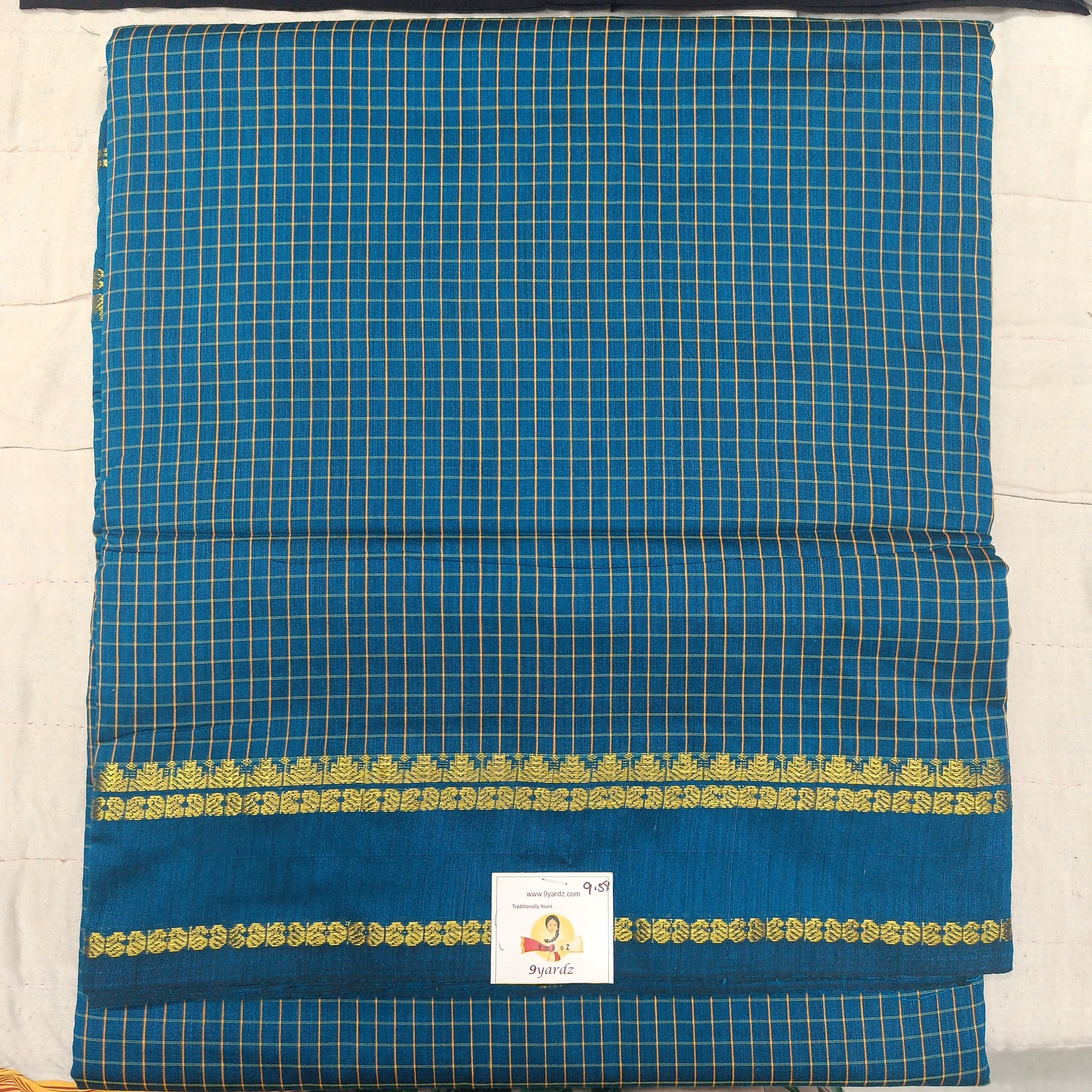 Kalyani Cotton checked 9.5 yards