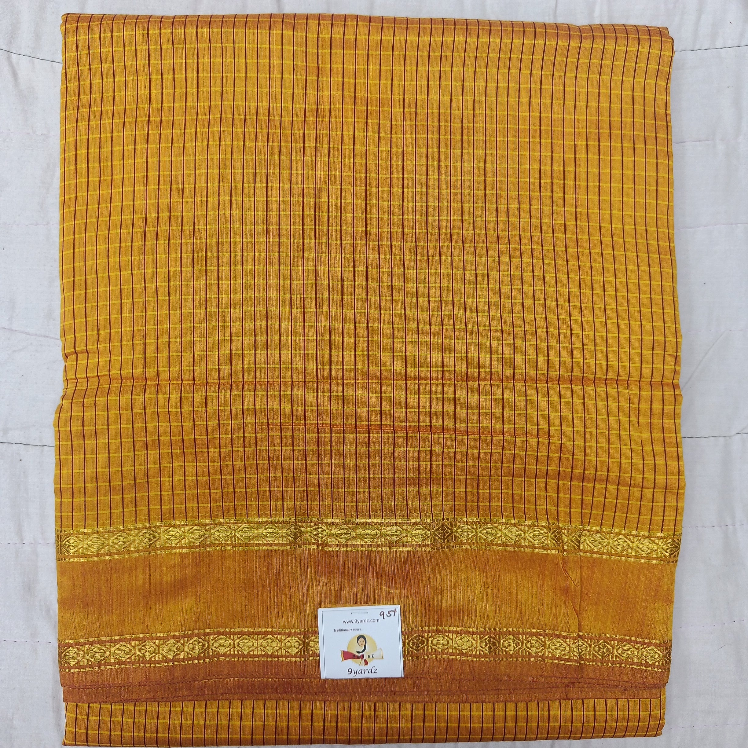 Kalyani Cotton checked 9.5 yards