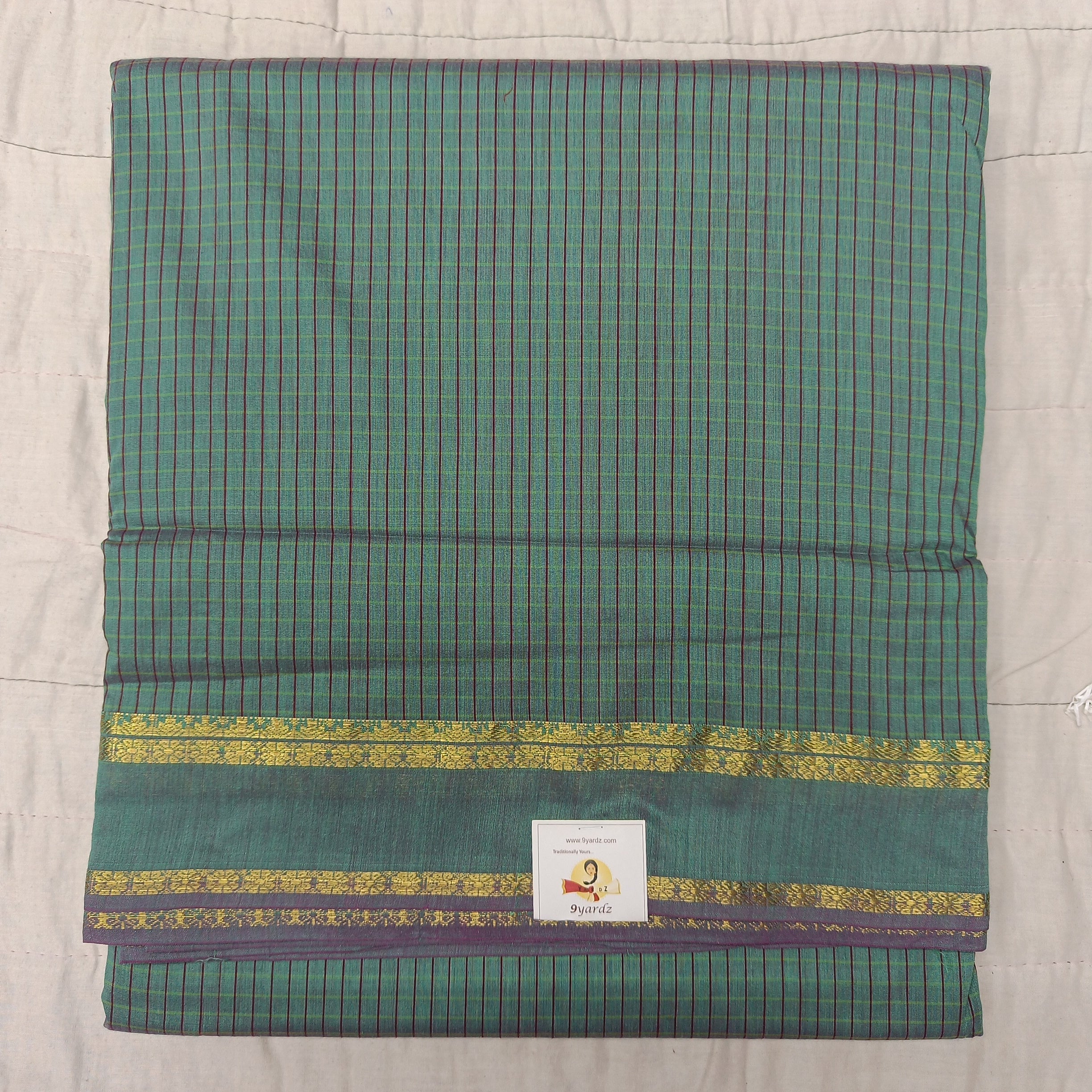 Kalyani Cotton checked 9.5 yards