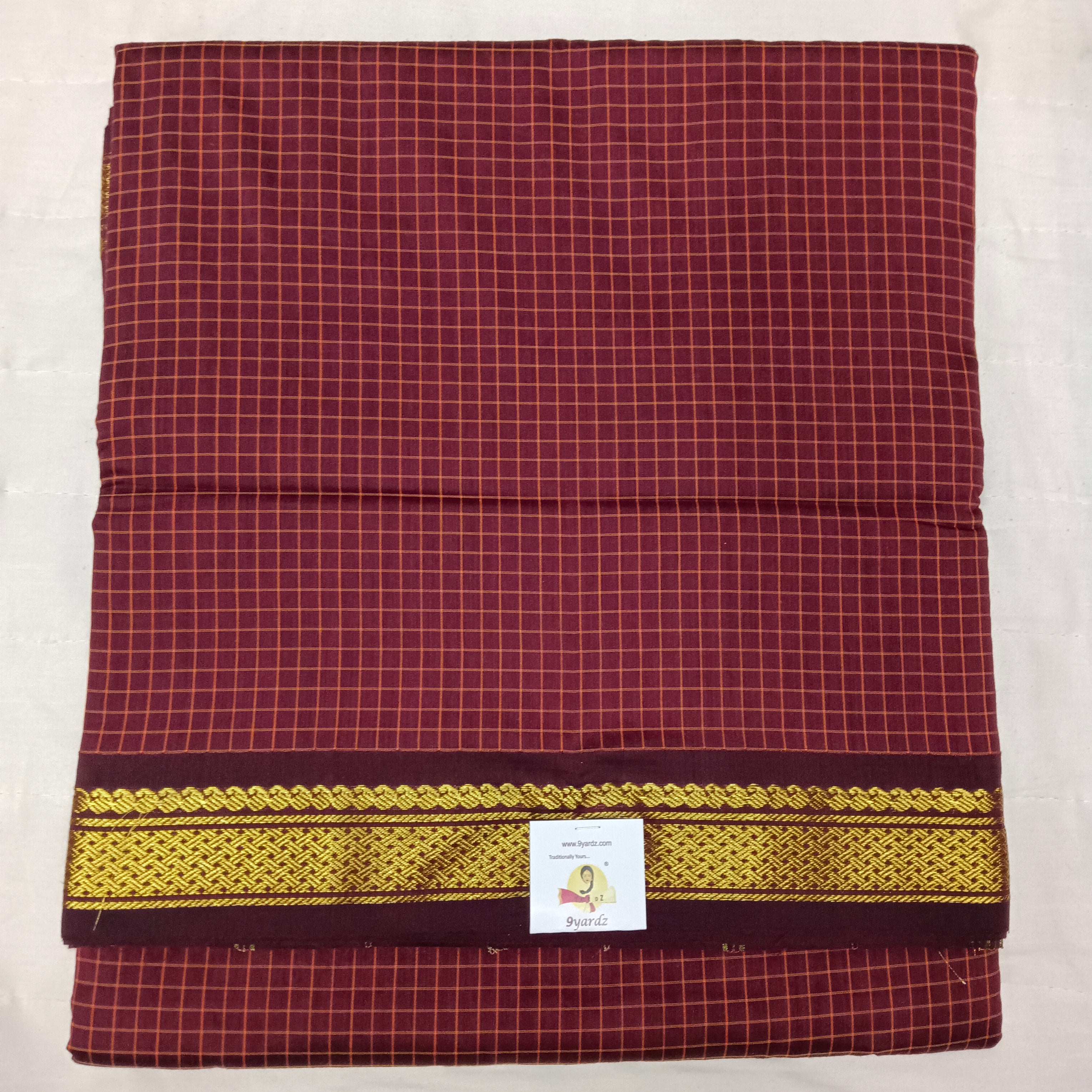 Kalyani Cotton checked  9.5 yards