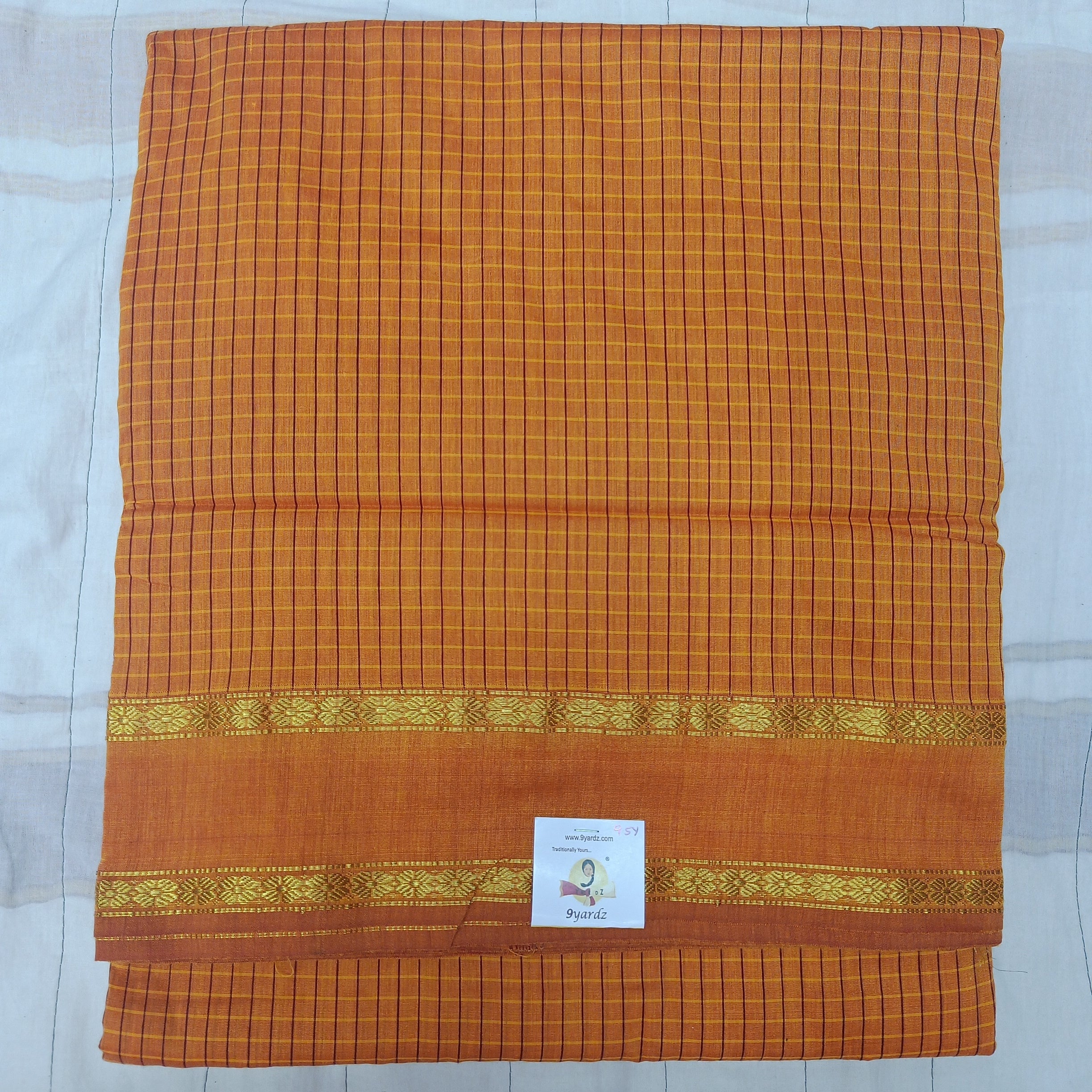 Kalyani Cotton checked  9.5 yards