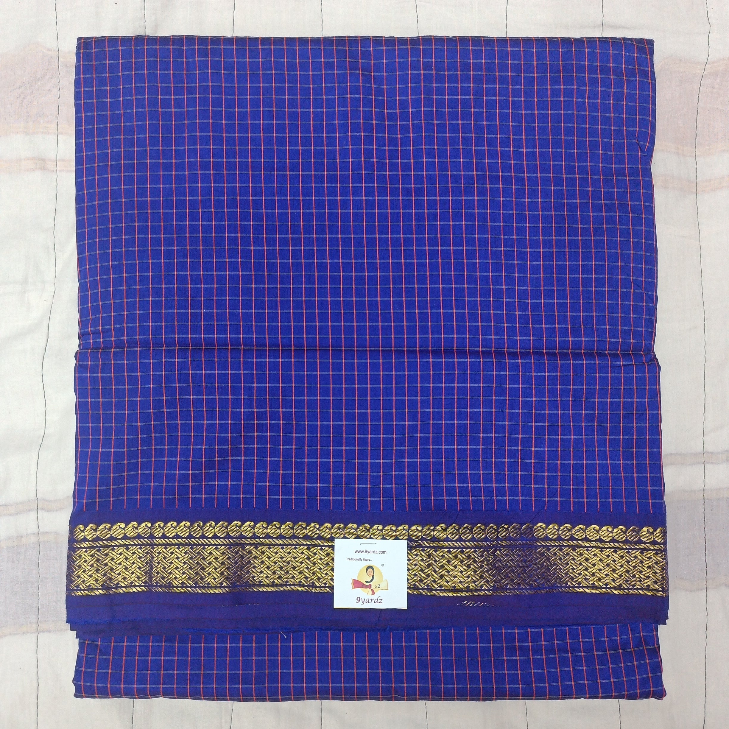 Kalyani Cotton checked  9.5 yards
