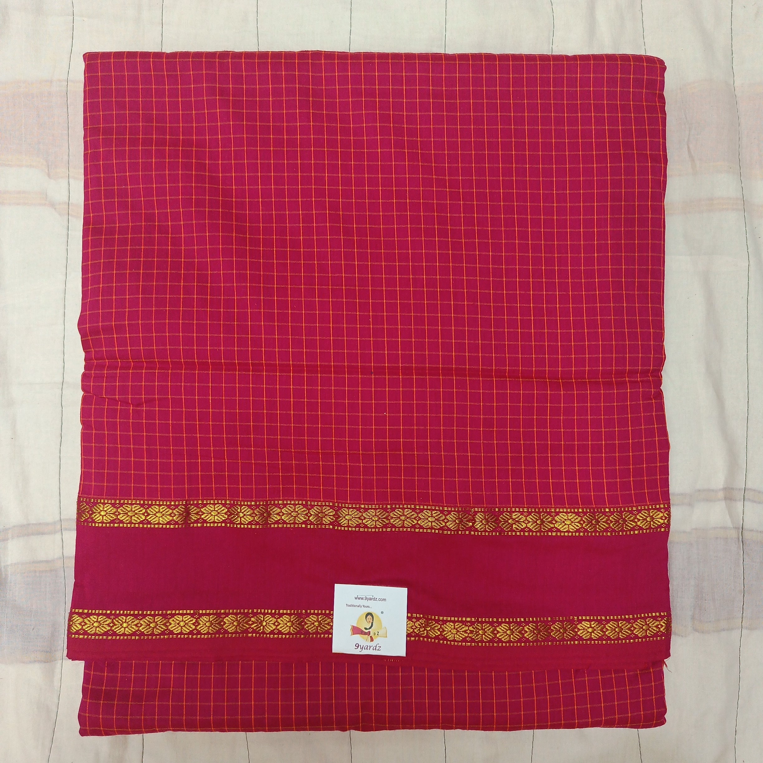 Kalyani Cotton checked  9.5 yards