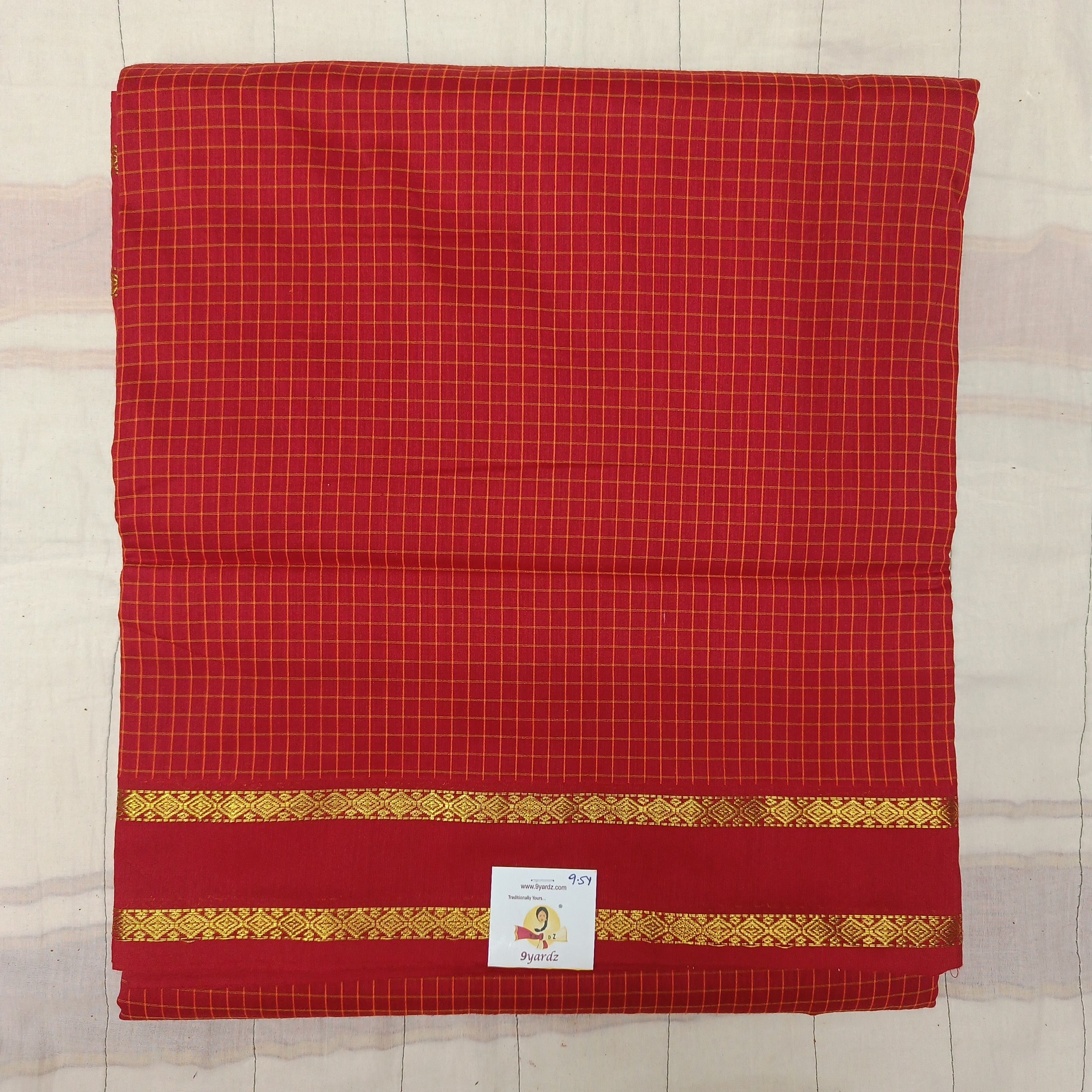 Kalyani Cotton checked  9.5 yards