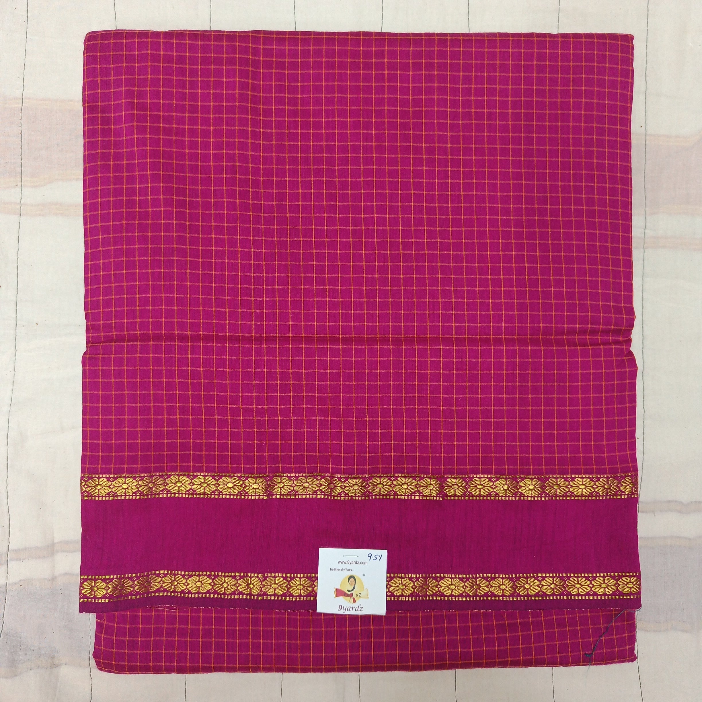 Kalyani Cotton checked  9.5 yards
