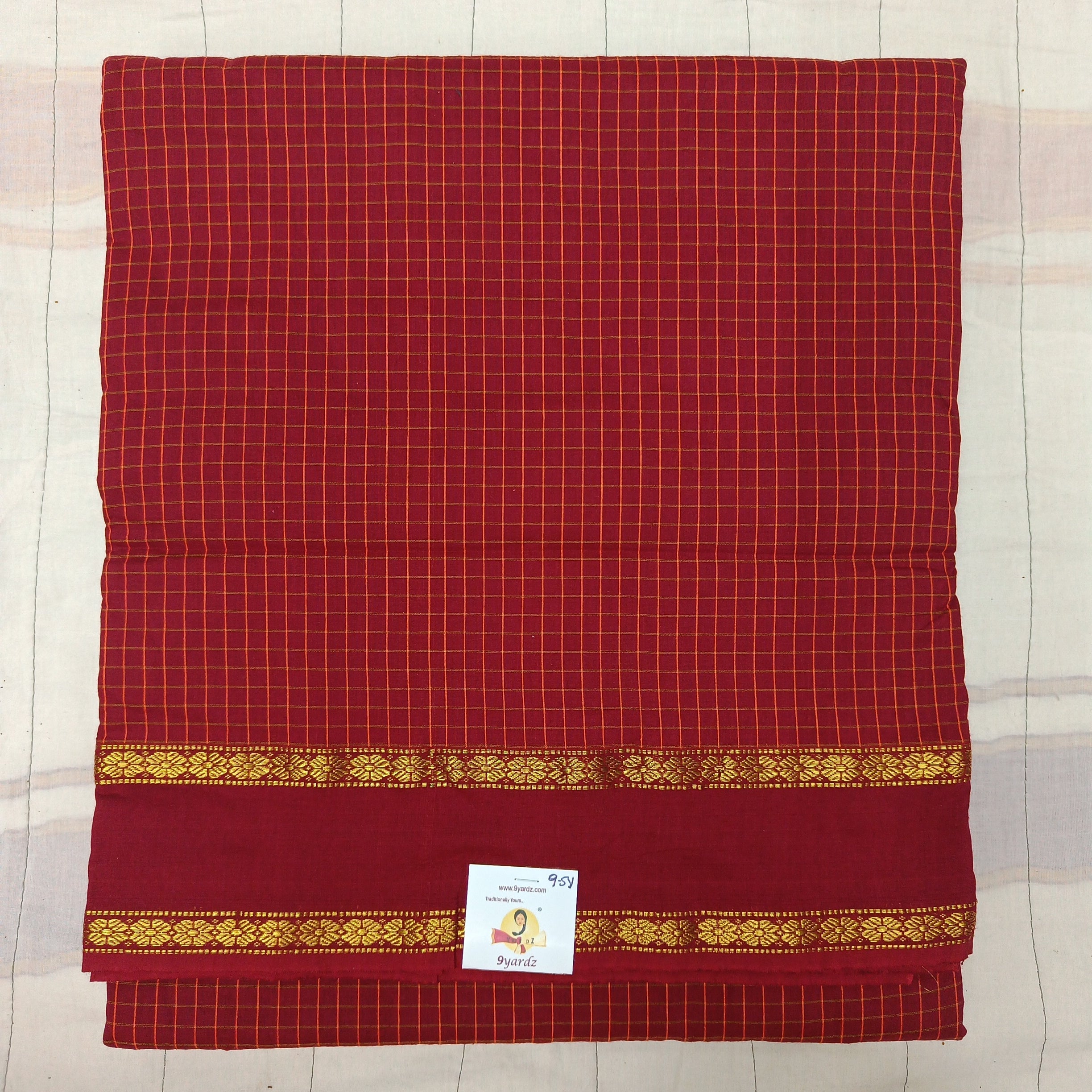 Kalyani Cotton checked  9.5 yards
