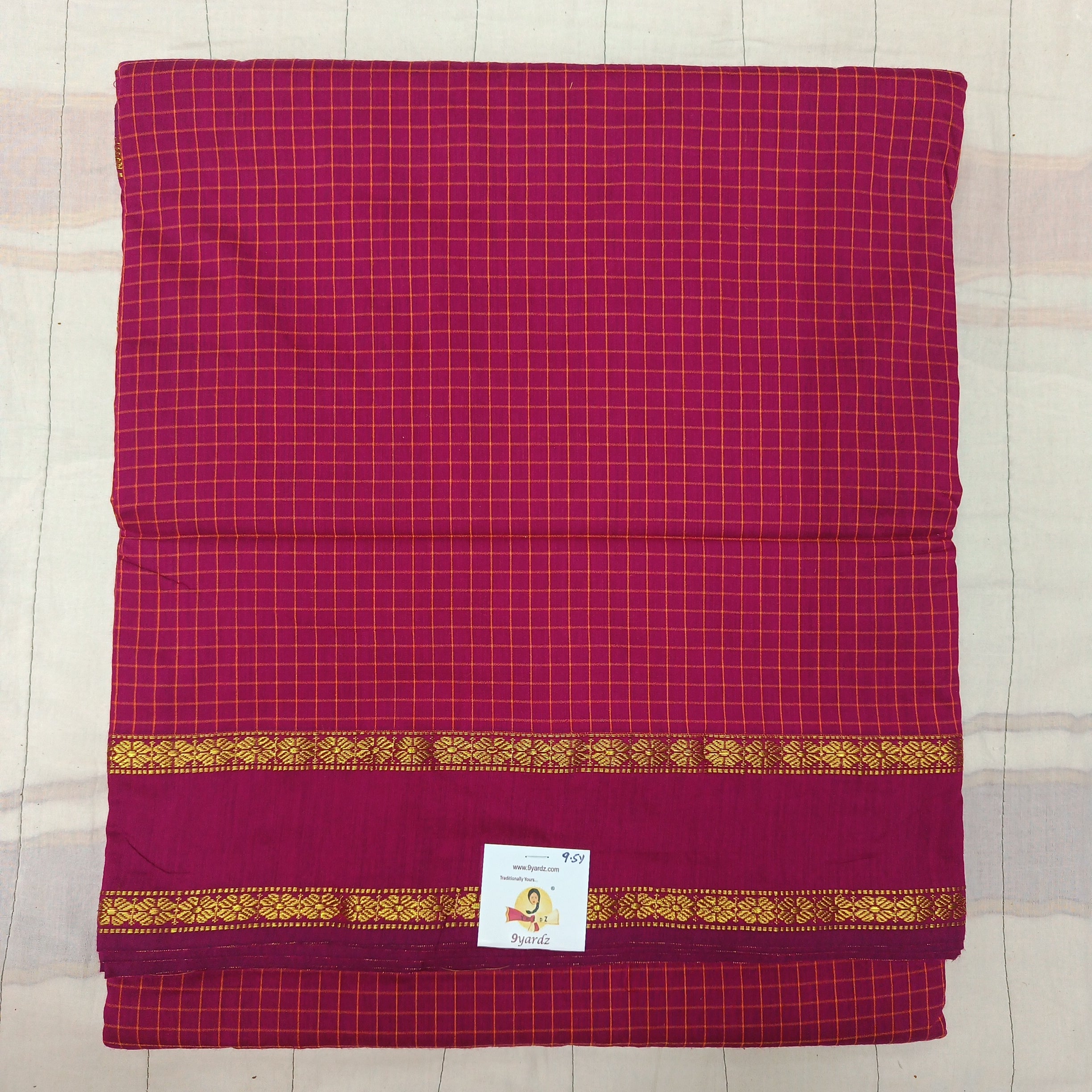 Kalyani Cotton checked  9.5 yards