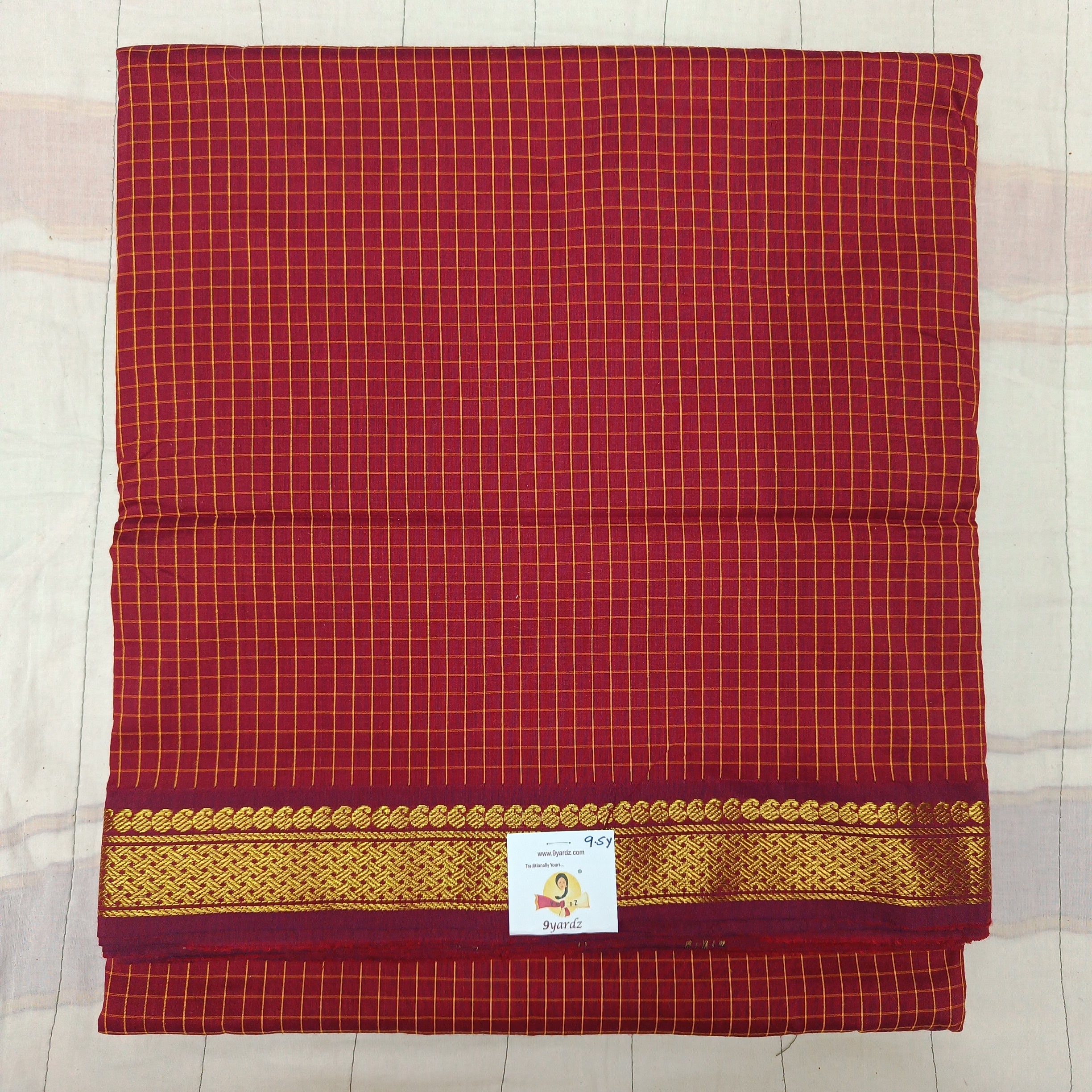 Kalyani Cotton checked  9.5 yards