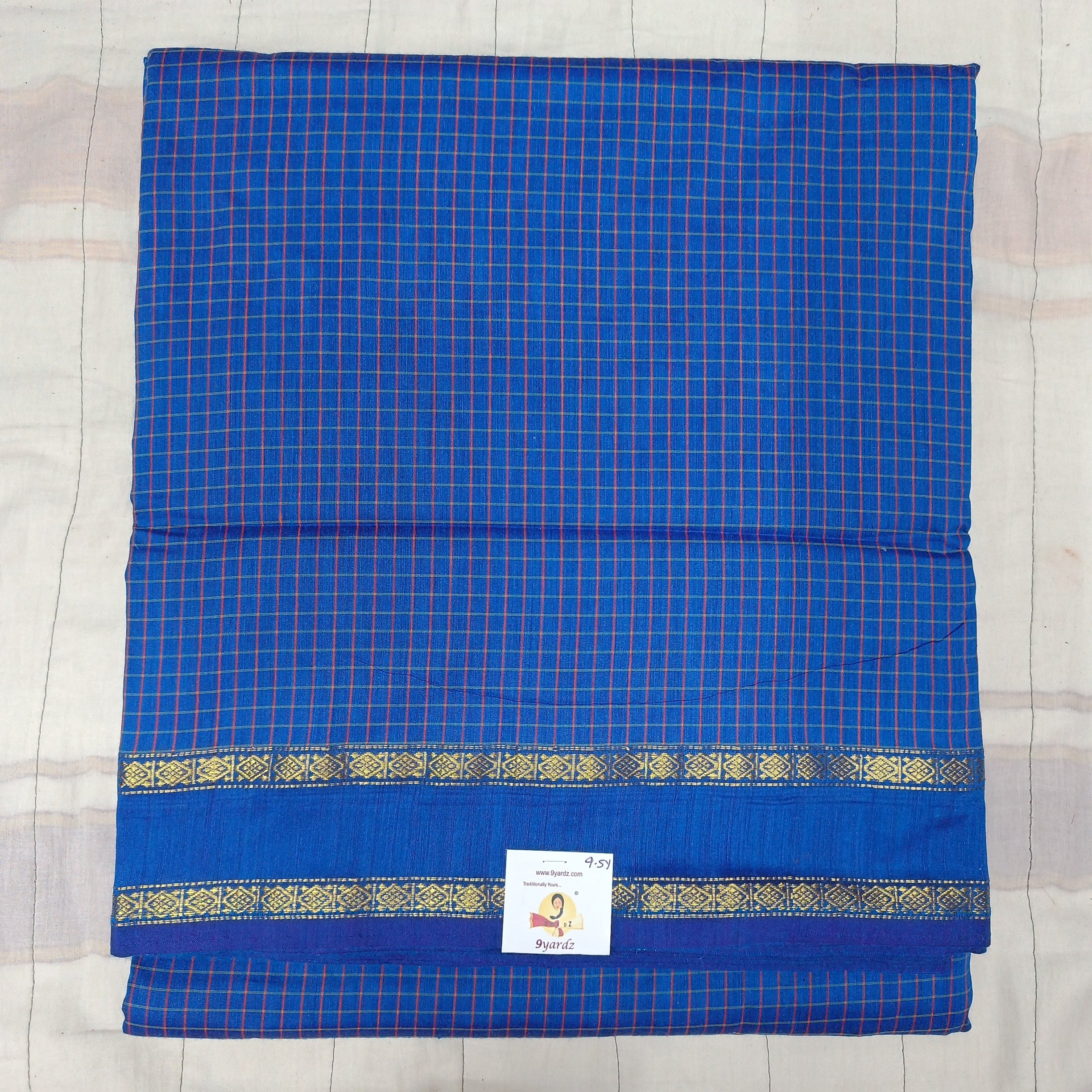 Kalyani Cotton checked  9.5 yards