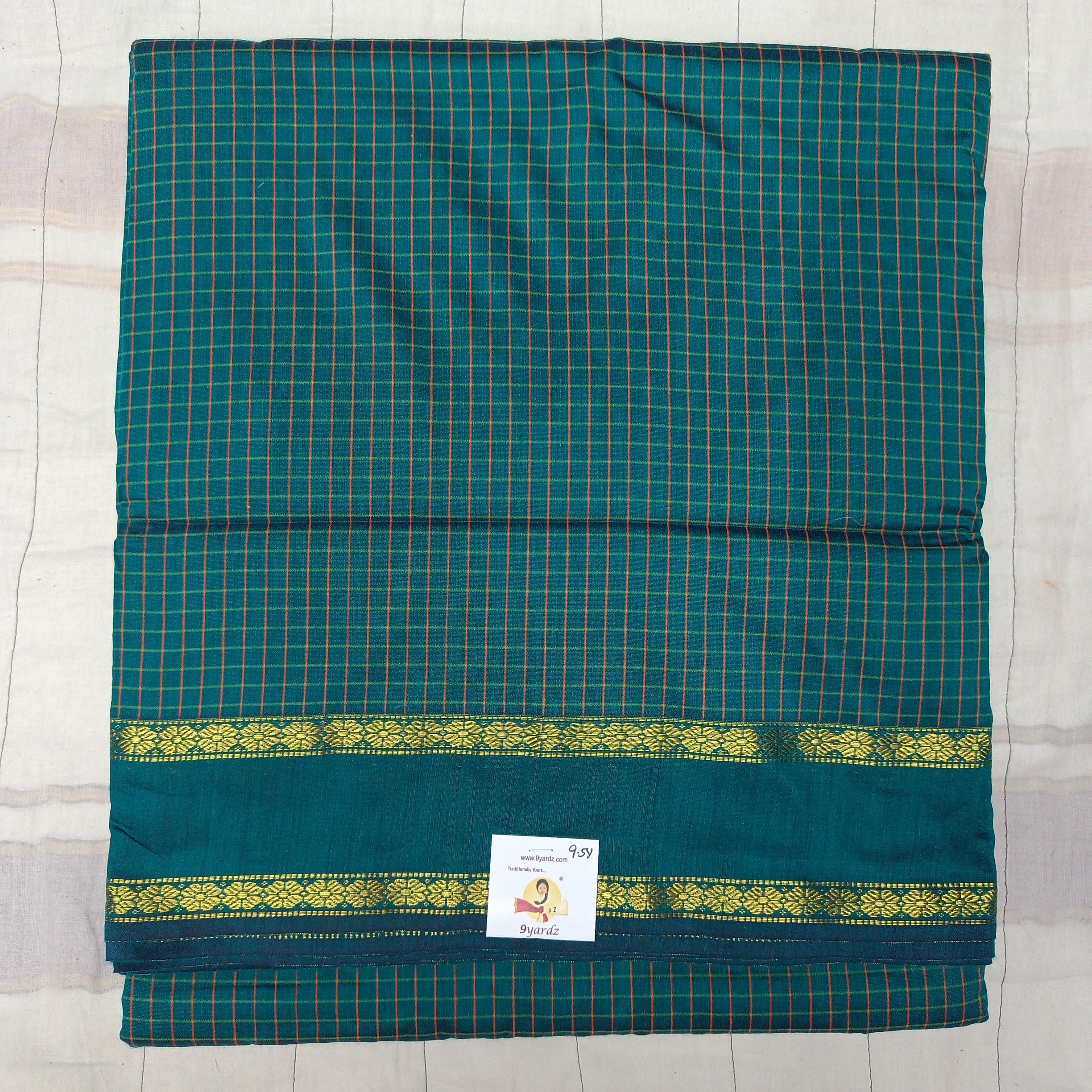 Kalyani Cotton checked  9.5 yards