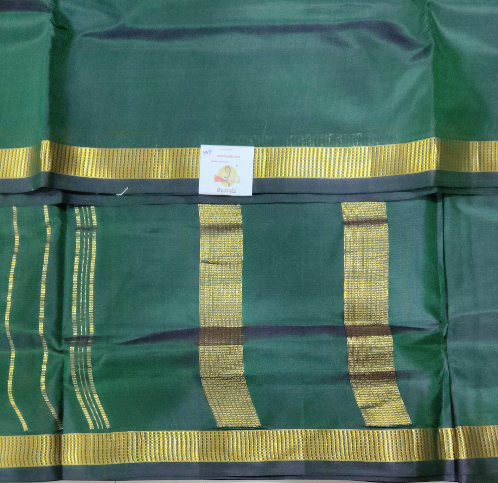 Bottle Green and LIC Broder
 Pure Silk 10-Yard Saree with Golden Zari LIC Motif Border – 9yardz Traditional Collection