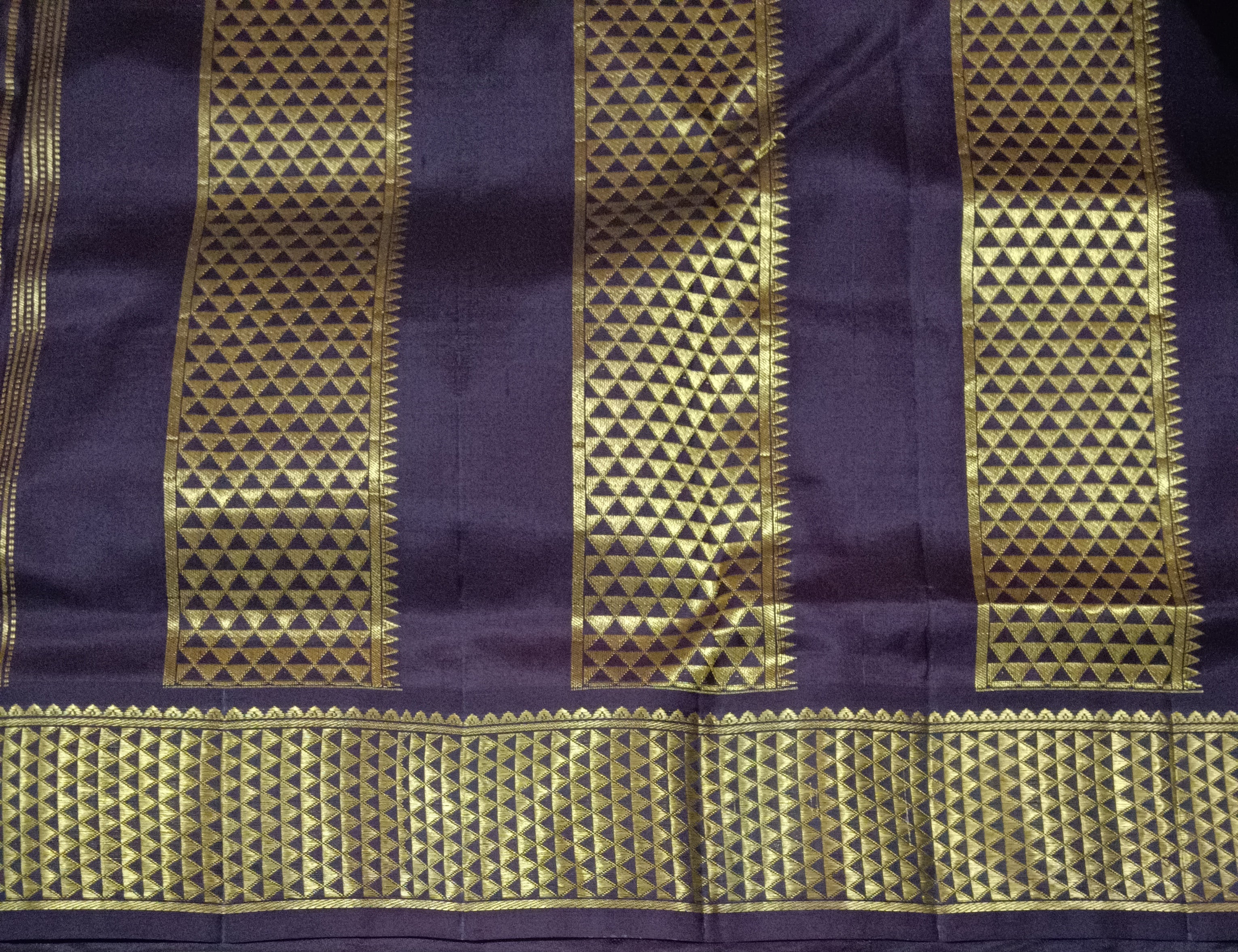 Pure silk Purple by dark brown with zari checks and Peacock and Chakra motifs saree