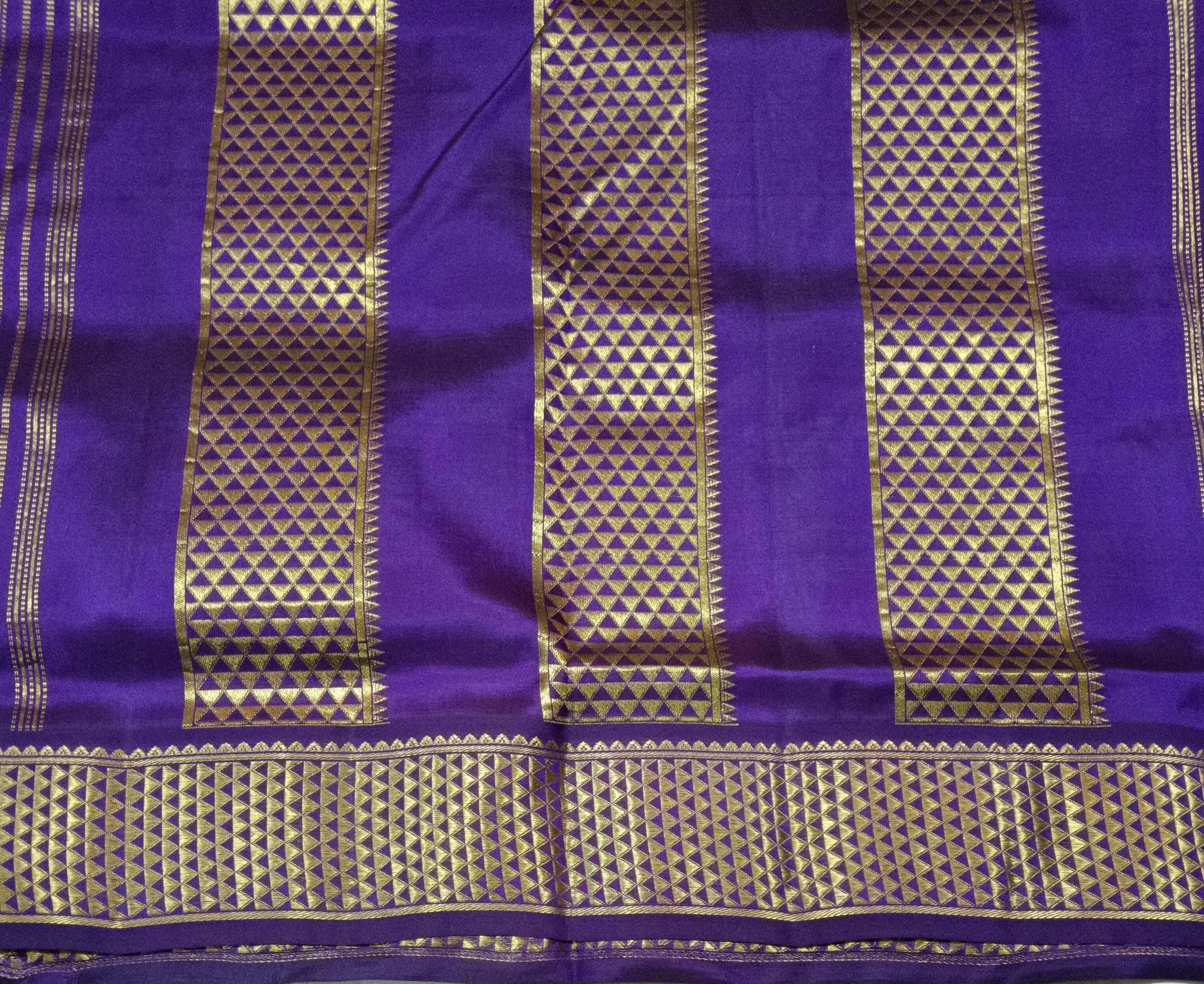 Pure silk Aqua green by Purple with zari checks and Peacock and Chakra motifs saree
