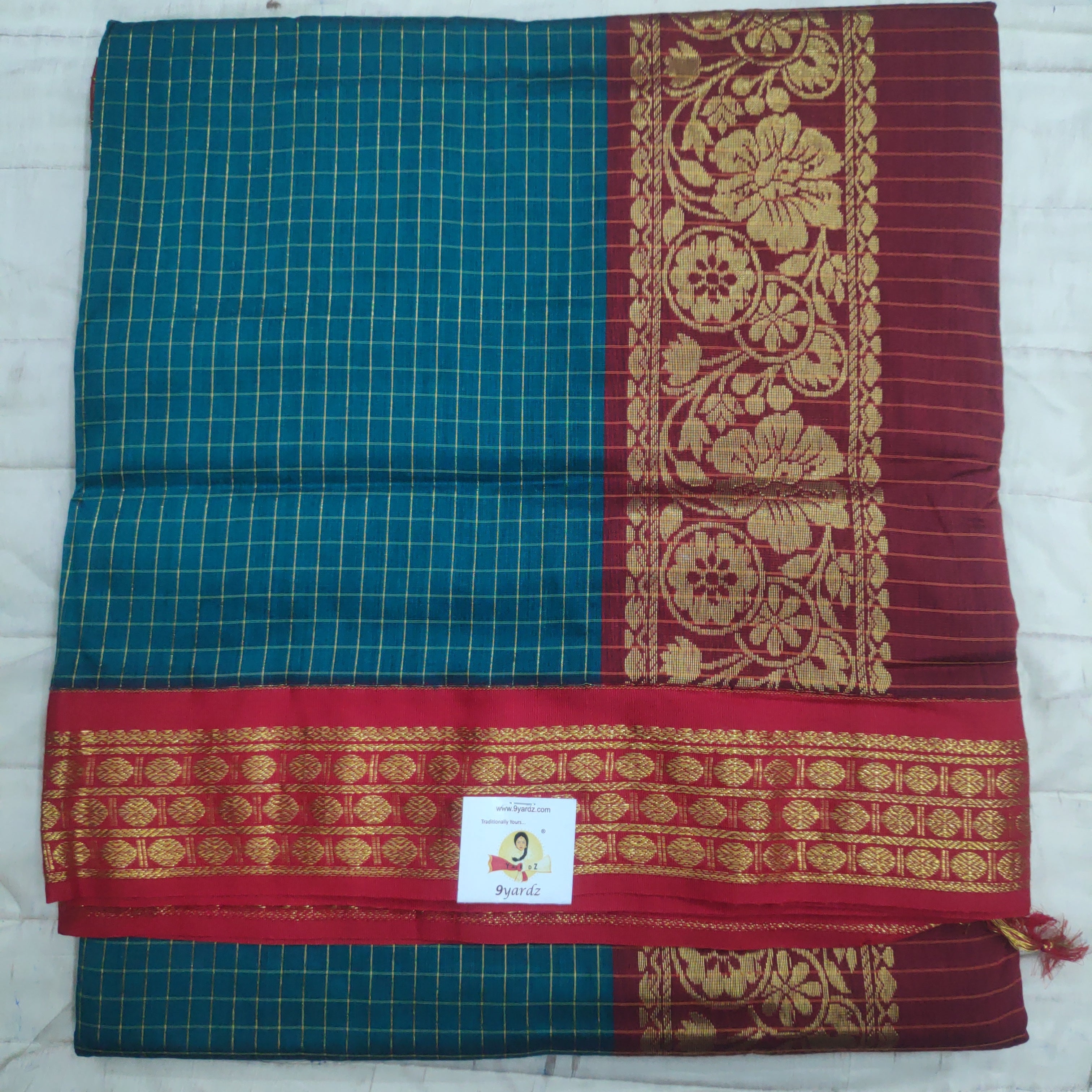 Kalyani Cotton checked  9.5 yards