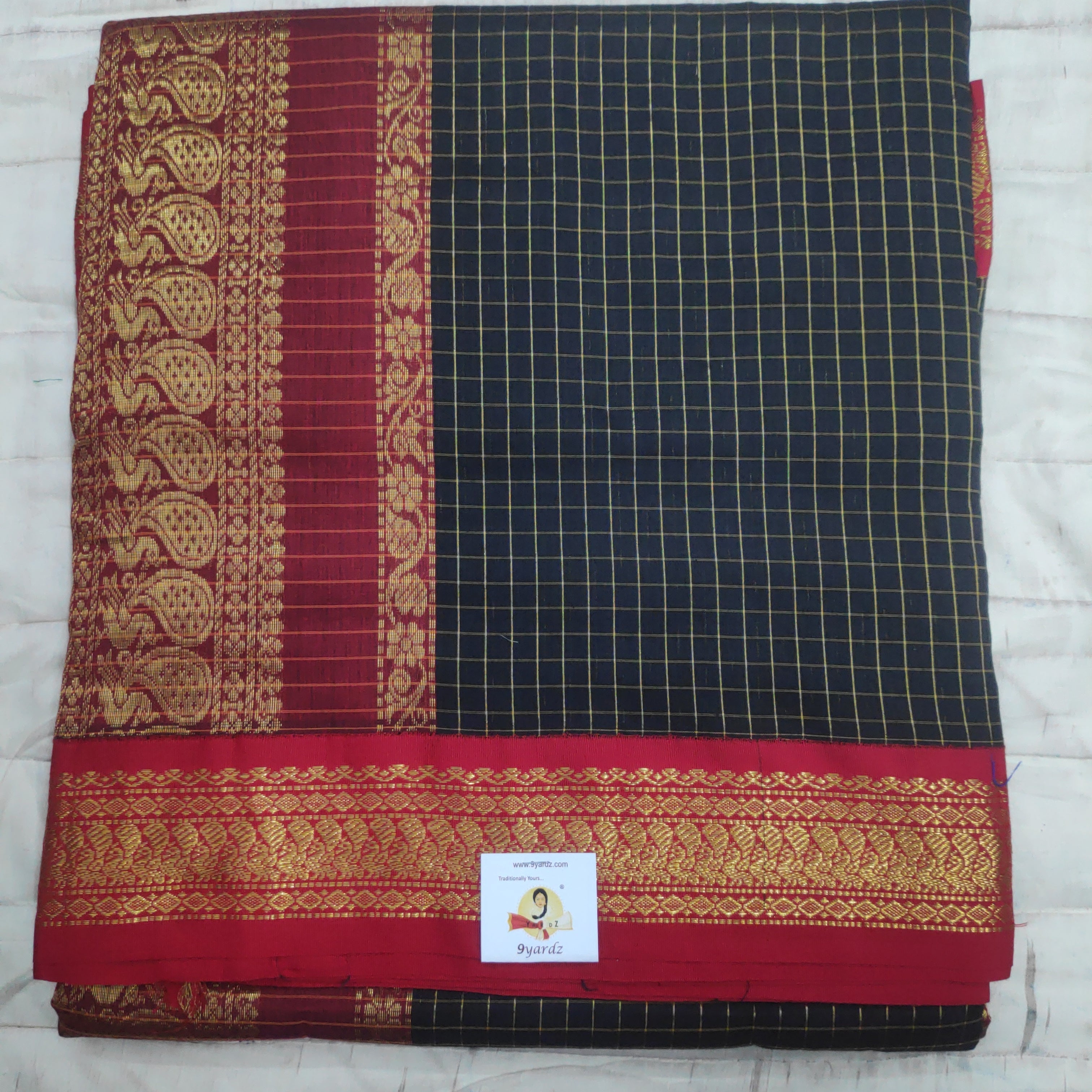 Kalyani Cotton checked  9.5 yards