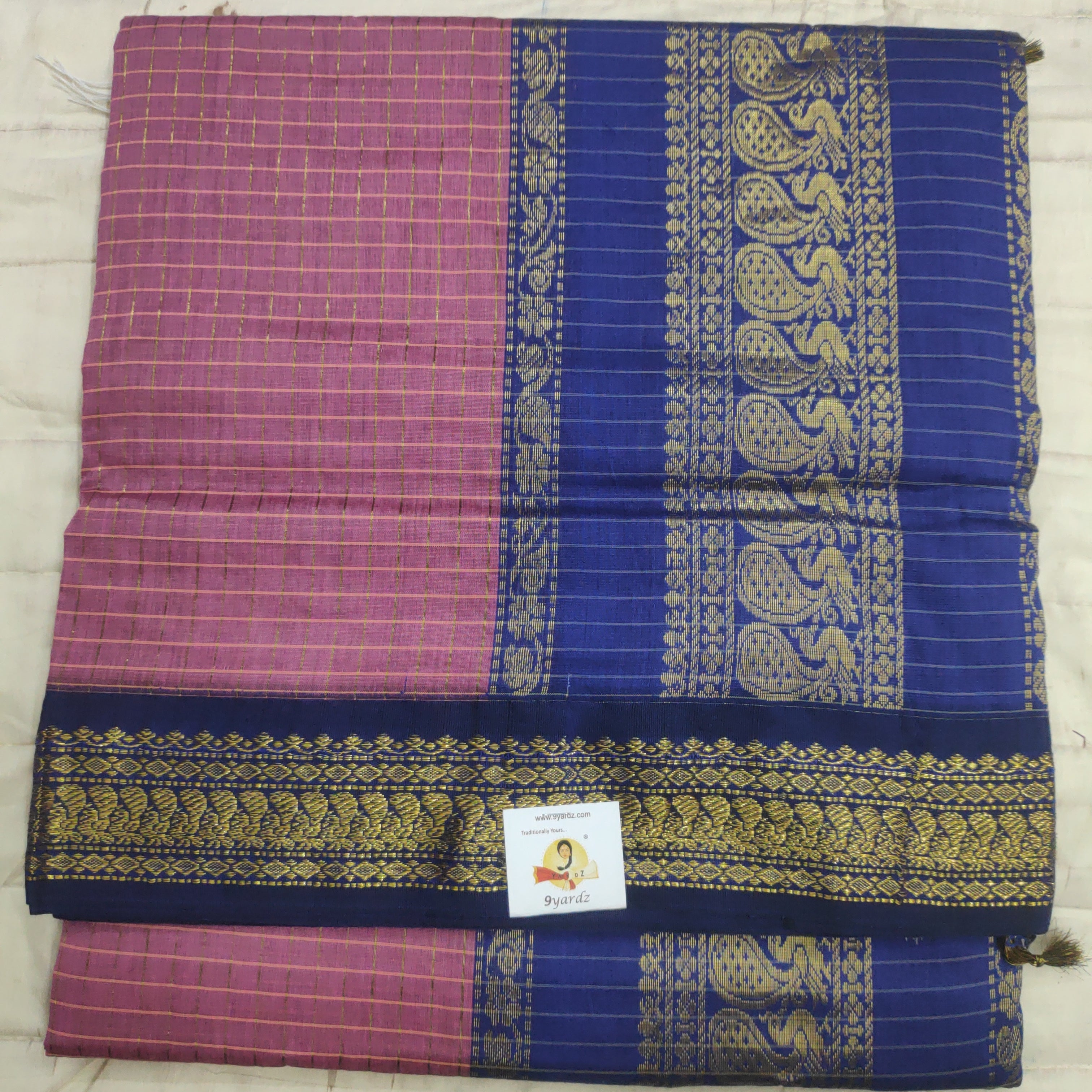 Kalyani Cotton checked  9.5 yards