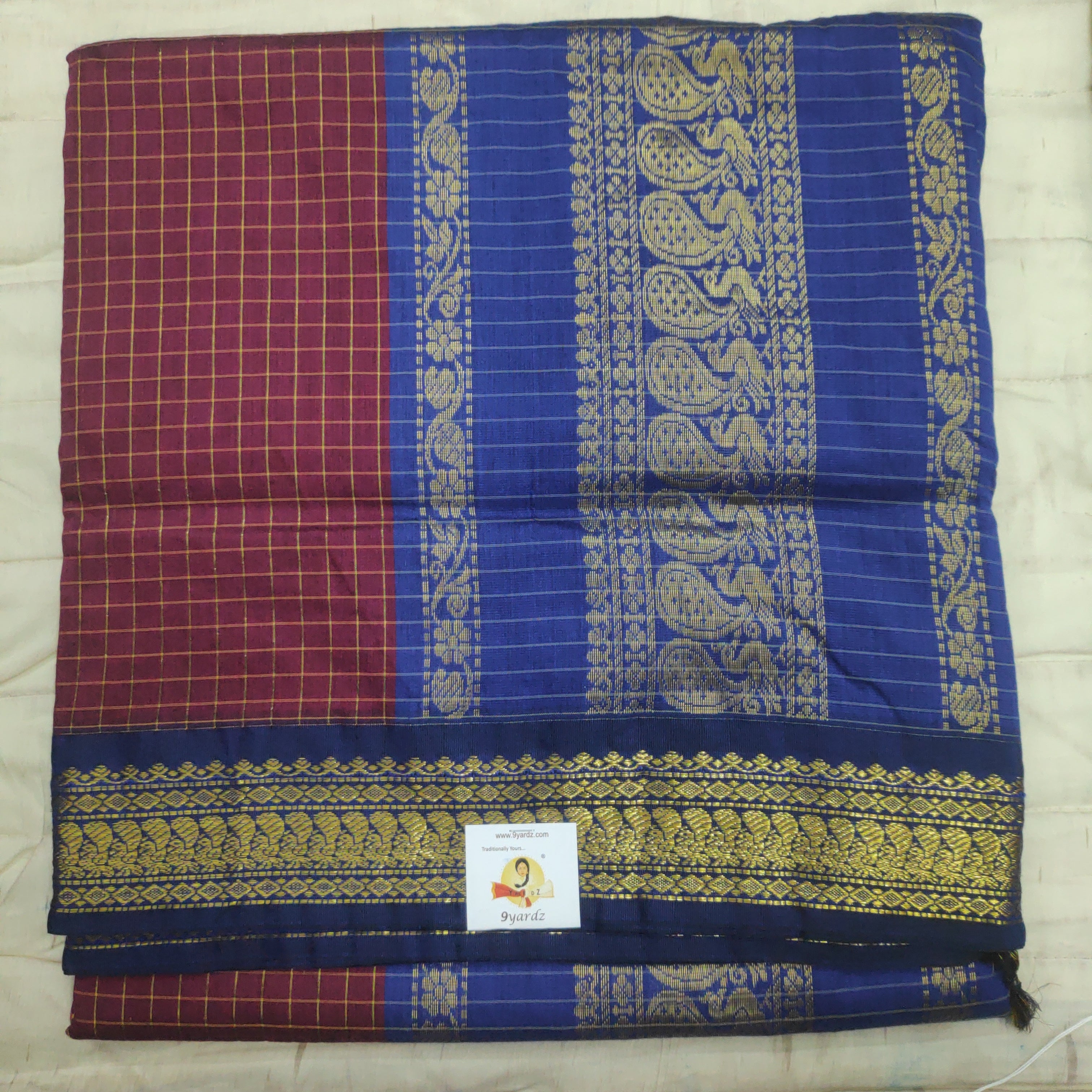 Kalyani Cotton checked  9.5 yards