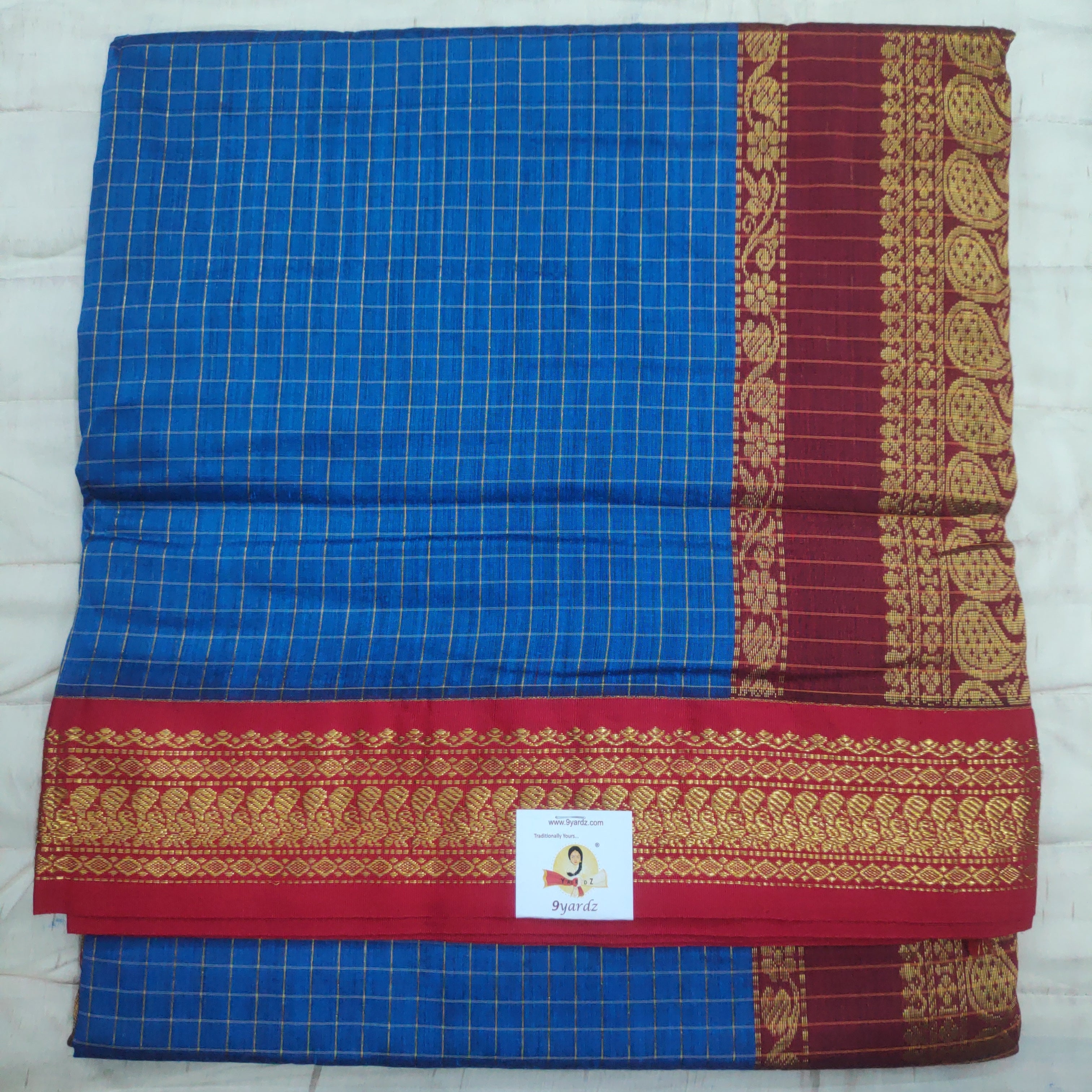 Kalyani Cotton checked  9.5 yards