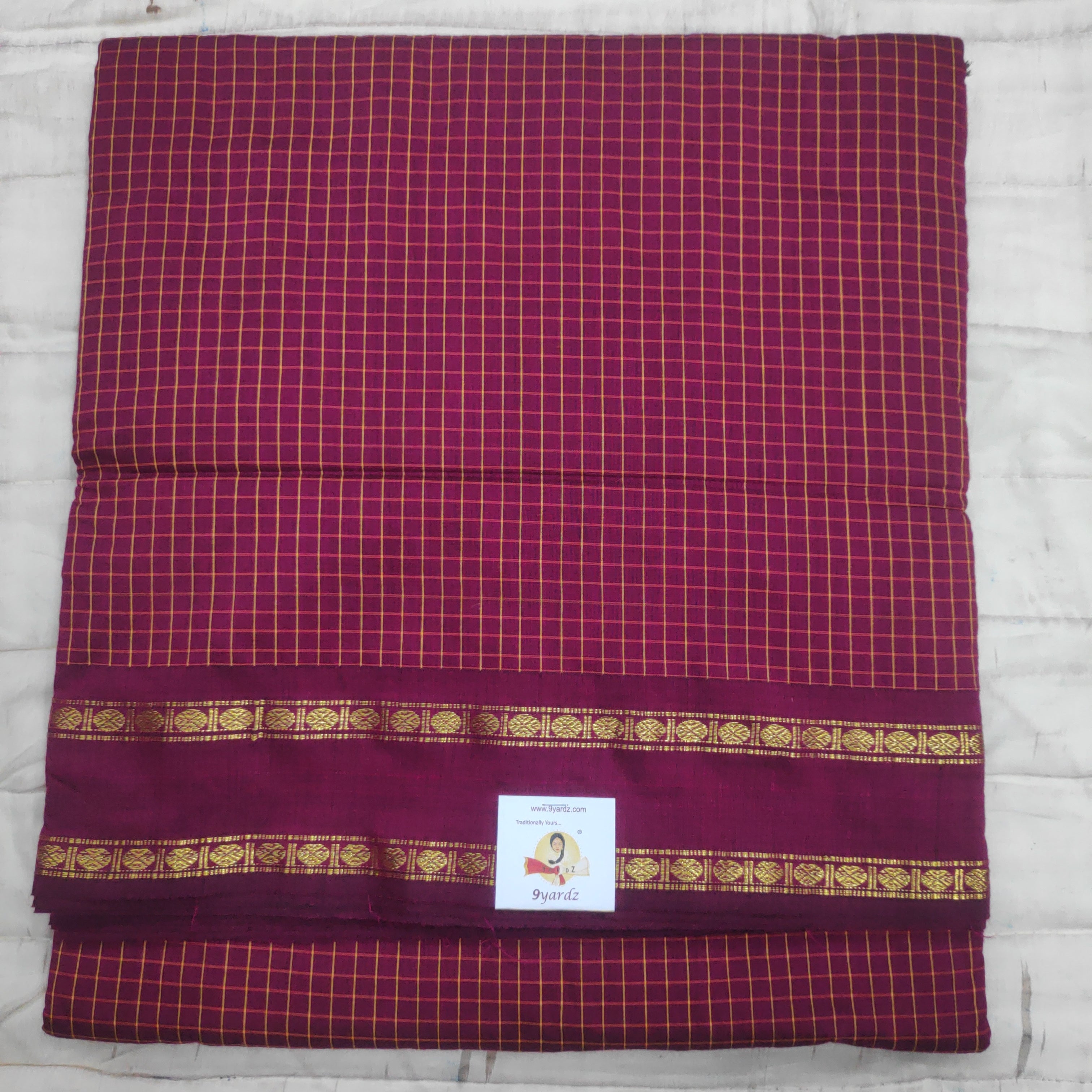 Kalyani Cotton checked  9.7 yards