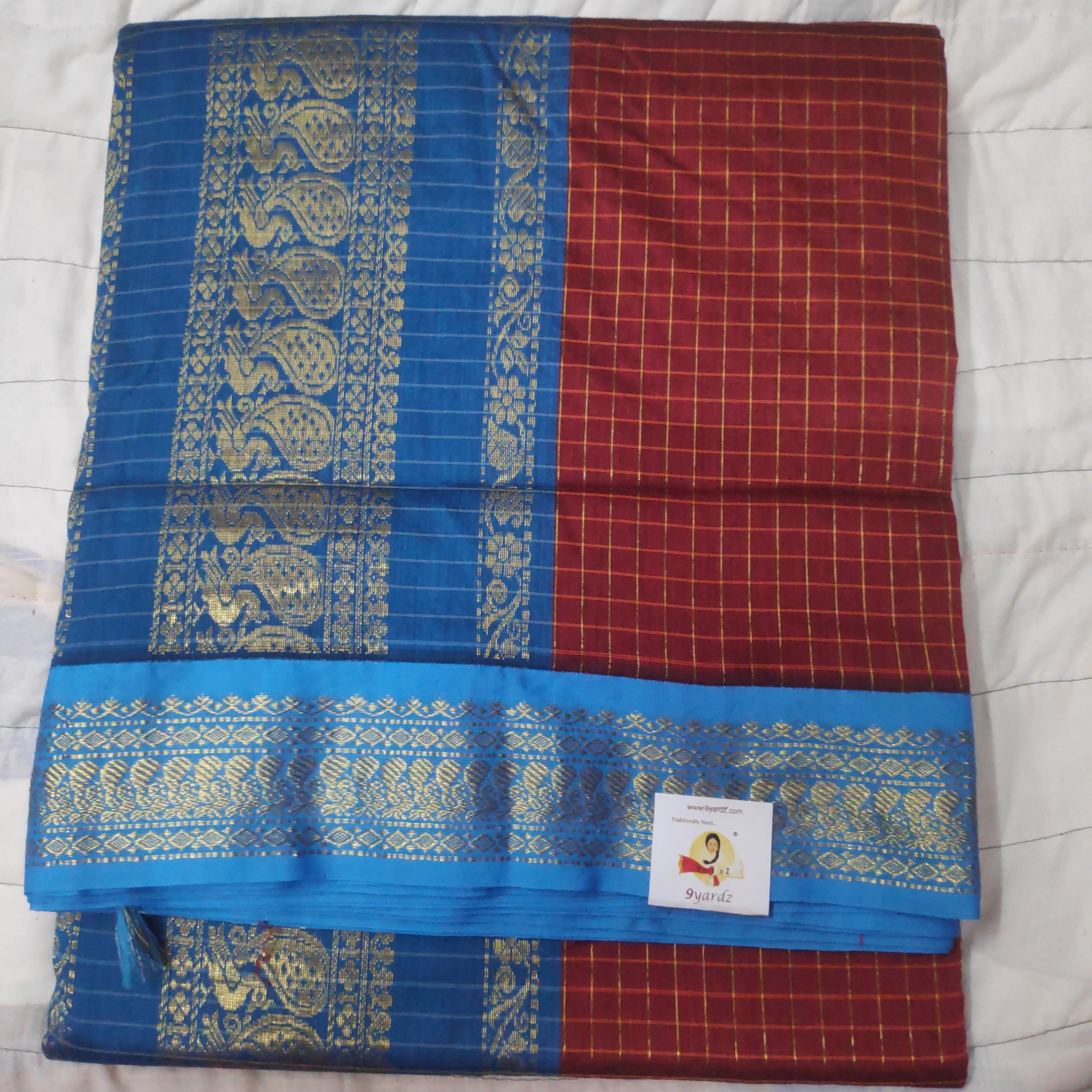 Kalyani Cotton checked  9.5 yards